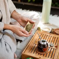 man-preparing-yerba-mate-side-view